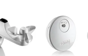 Drie Somfy sensoren: regen- en windsensor, ronde draadloze sensor en ronde bedieningsknop met logo